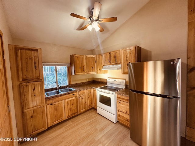 kitchen with sink, vaulted ceiling, light hardwood / wood-style flooring, white electric stove, and stainless steel fridge