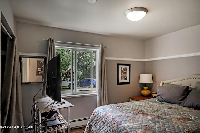 bedroom featuring a baseboard radiator