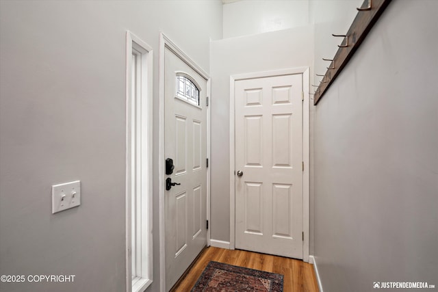 doorway featuring hardwood / wood-style flooring