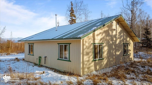 view of snow covered property