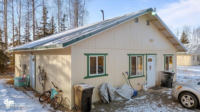 view of snow covered property