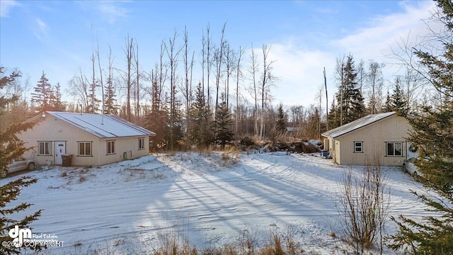 view of yard layered in snow