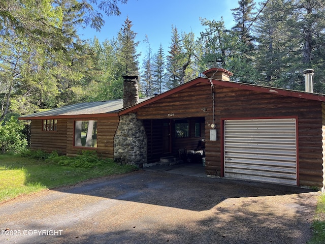 log home with a garage