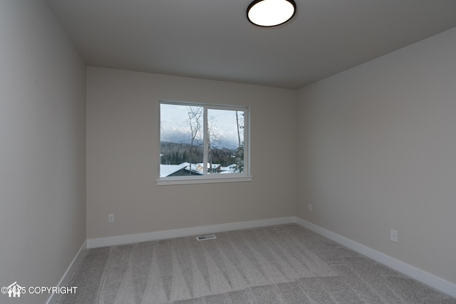 view of carpeted spare room