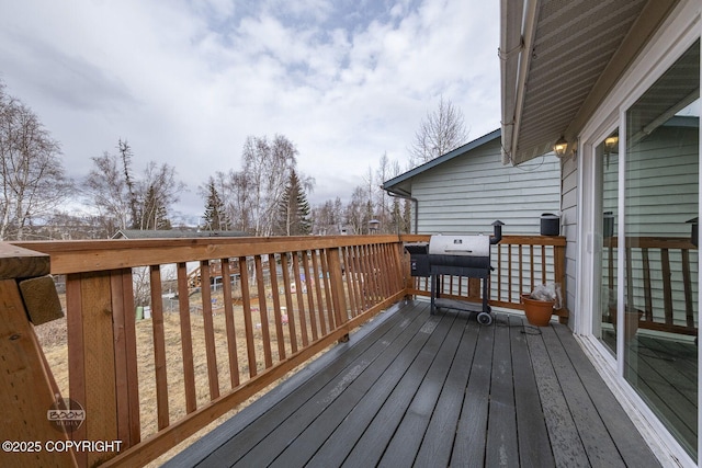 wooden deck with area for grilling