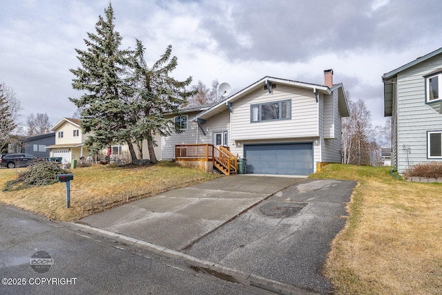 7025 Fredricks Dr, Anchorage, AK 99504 - view of front of property featuring a chimney, driveway, a front yard, and an attached garage