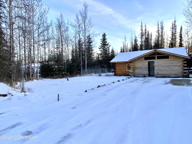 view of yard covered in snow