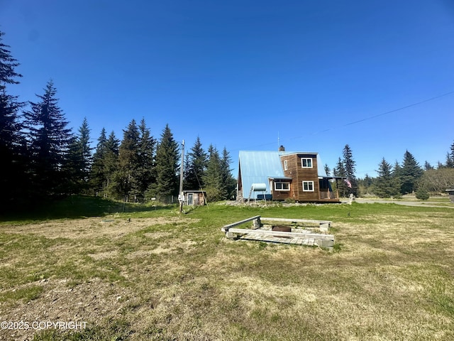 1060 Jeffery Ave, Homer, AK 99603 - view of grassy yard featuring an outbuilding