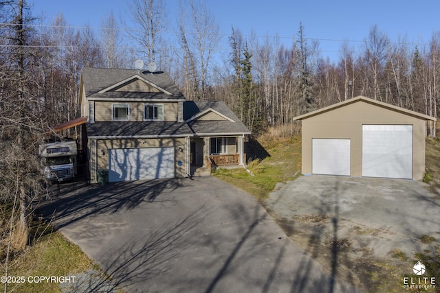 front of property featuring a porch and a garage