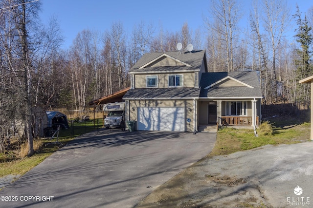 view of front of property featuring a garage, a carport, and covered porch