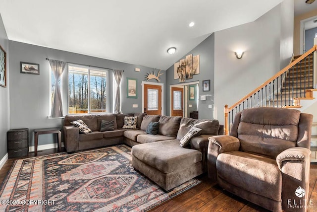 living room with vaulted ceiling and dark hardwood / wood-style floors