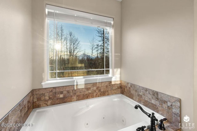 bathroom with tiled tub