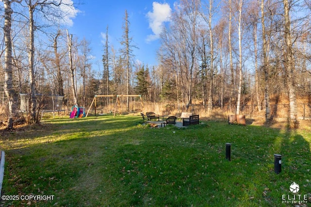 view of yard featuring a playground