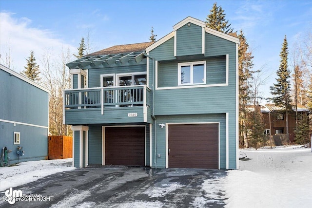 view of front of property featuring driveway and an attached garage