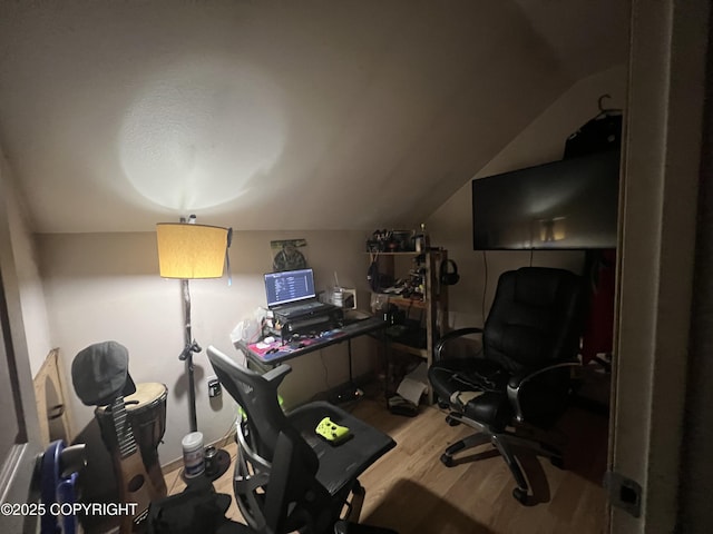 office featuring wood-type flooring and vaulted ceiling