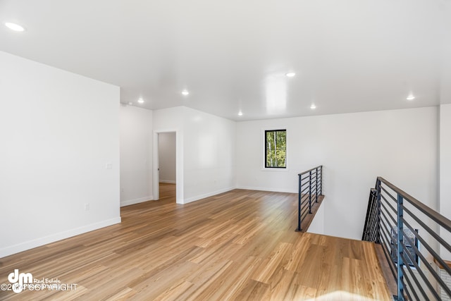 unfurnished room featuring light hardwood / wood-style floors