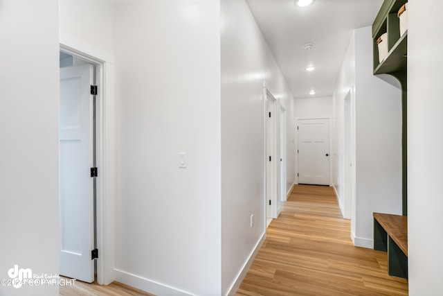 hallway featuring light wood-type flooring