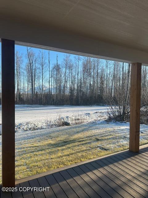 view of snow covered deck