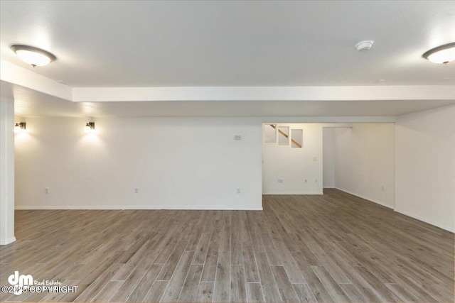 basement featuring hardwood / wood-style flooring