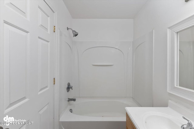 bathroom featuring vanity and shower / washtub combination