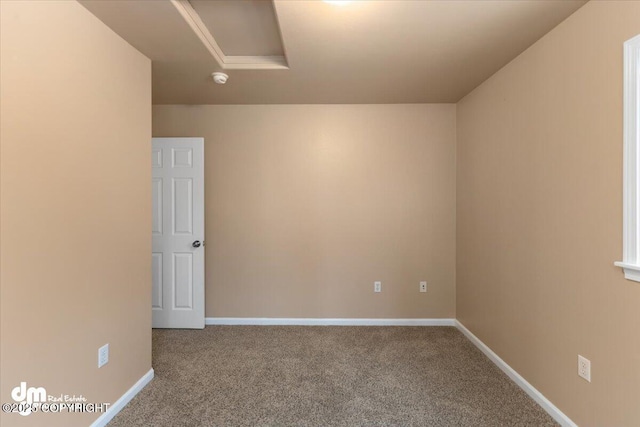 view of carpeted spare room