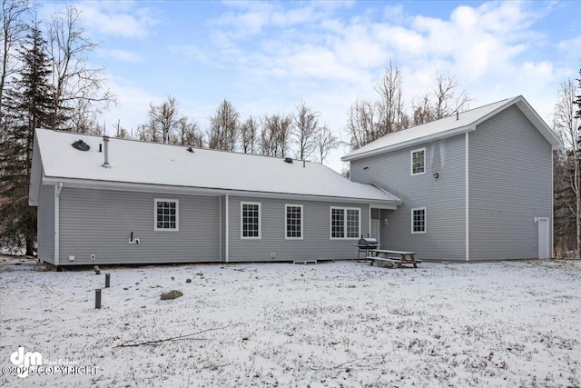 view of snow covered property