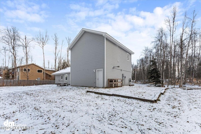 view of snow covered property