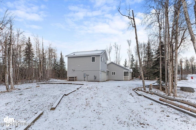 view of snow covered house