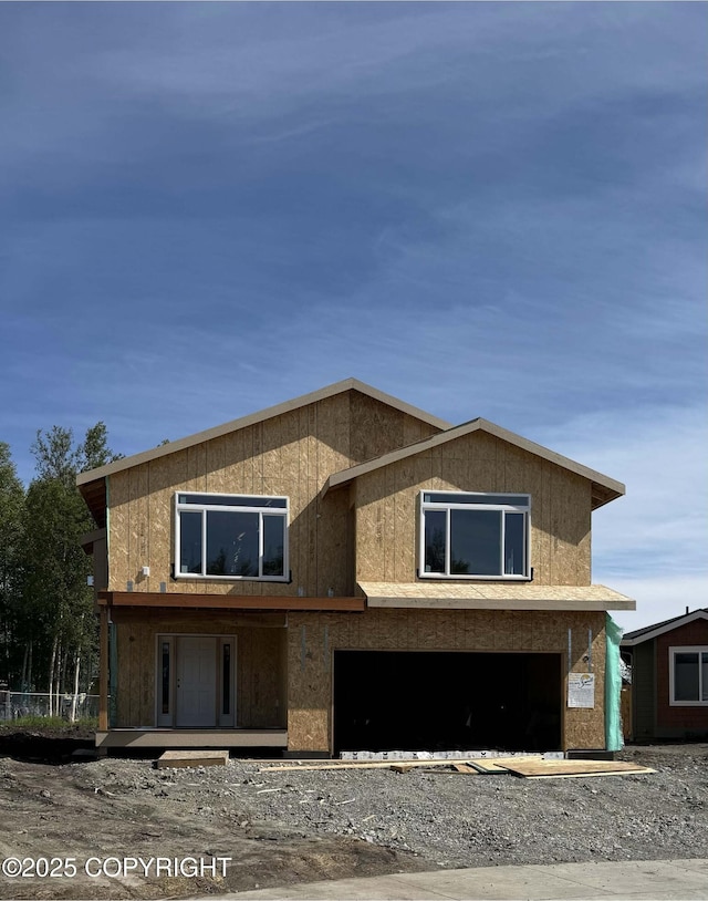 3769 Quartz Cir, Anchorage, AK 99502 - unfinished property featuring an attached garage and a porch