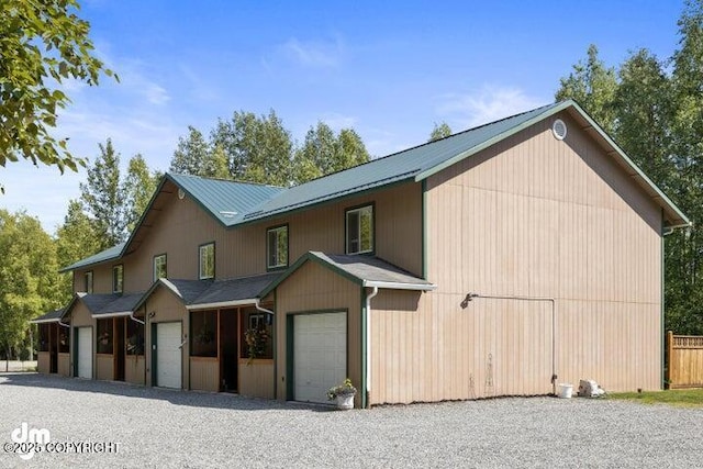 view of property exterior with a garage