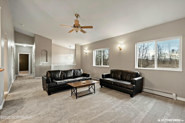 carpeted living room featuring ceiling fan, a baseboard radiator, baseboards, and vaulted ceiling