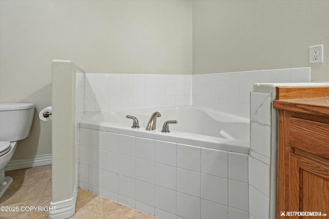 full bath with tile patterned floors, toilet, and a bath