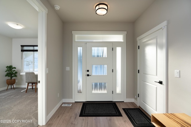 entryway featuring light hardwood / wood-style floors