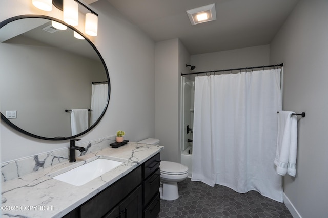 full bathroom featuring vanity, shower / bath combination with curtain, and toilet