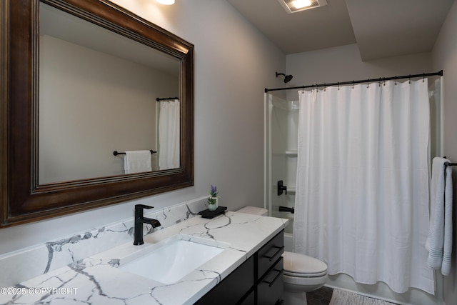 full bathroom with shower / bathtub combination with curtain, vanity, and toilet