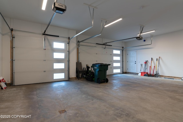 garage featuring a garage door opener