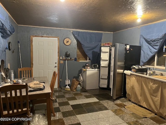 interior space with washer / clothes dryer and sink