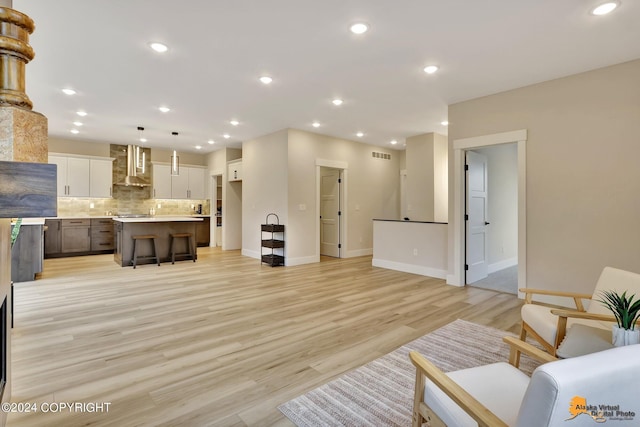 living room with light hardwood / wood-style floors