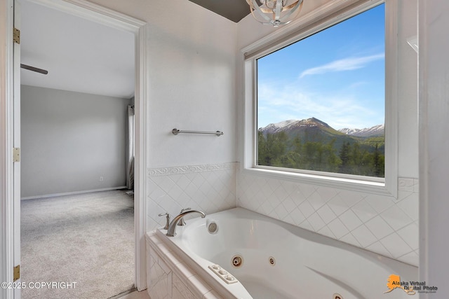 10235 Stewart Dr, Eagle River, AK 99577 - bathroom with a jetted tub and healthy amount of natural light