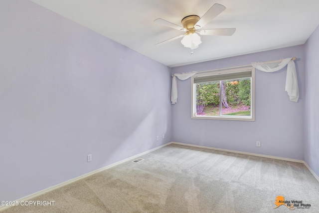 10235 Stewart Dr, Eagle River, AK 99577 - carpeted empty room featuring a ceiling fan and baseboards