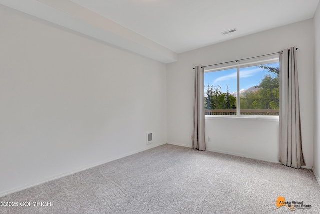 10235 Stewart Dr, Eagle River, AK 99577 - spare room featuring carpet floors and baseboards