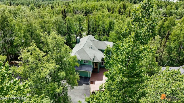 10235 Stewart Dr, Eagle River, AK 99577 - aerial view of property and surrounding area with a heavily wooded area