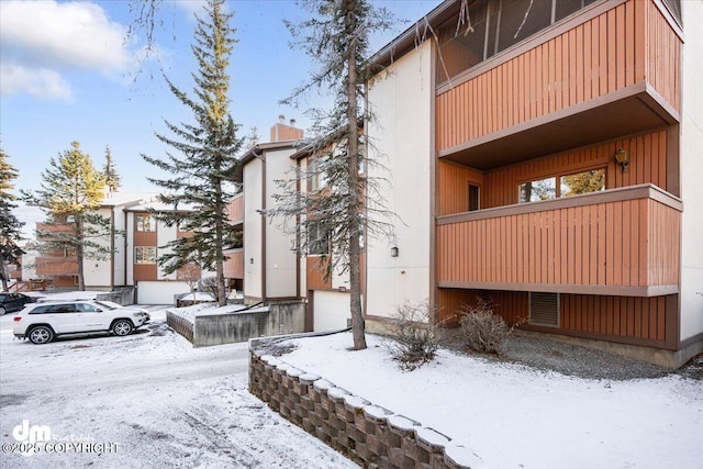 view of snow covered property