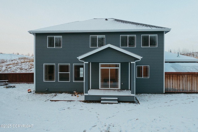 view of snow covered house