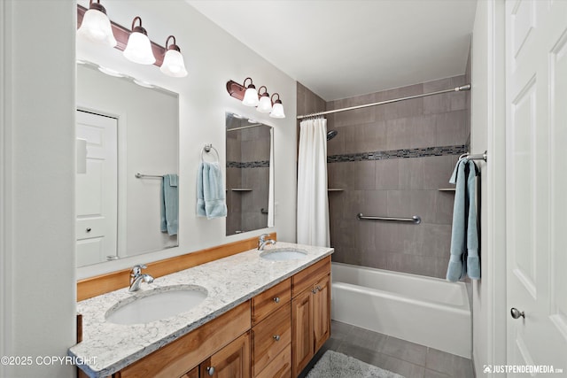 bathroom featuring shower / tub combo, vanity, and tile patterned floors