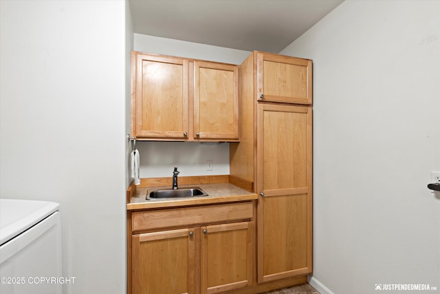 interior space featuring cabinets and sink