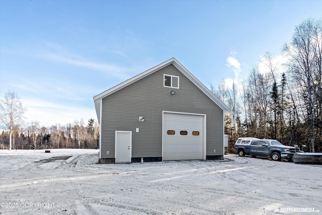 view of snow covered garage