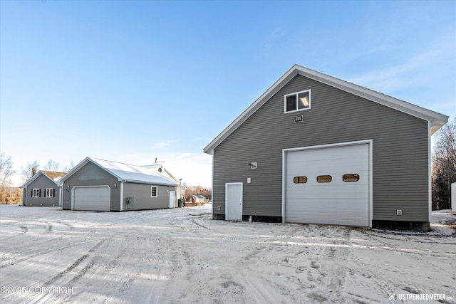 view of snow covered garage