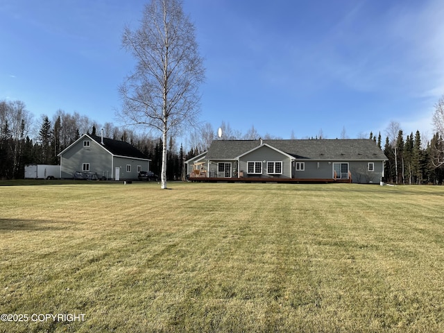 ranch-style house featuring a front lawn