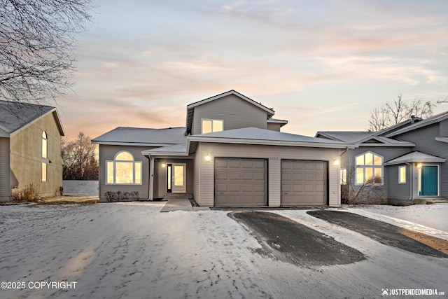 view of front of property featuring a garage